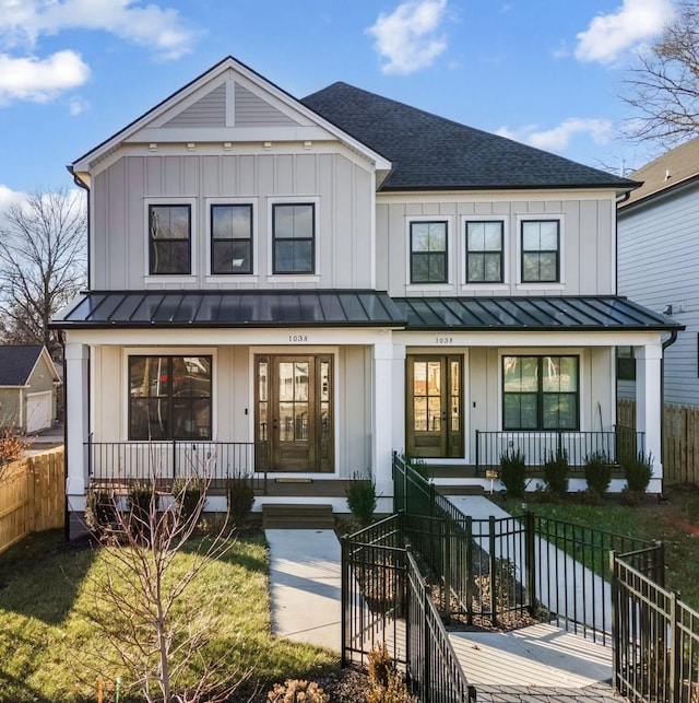 modern inspired farmhouse with a porch