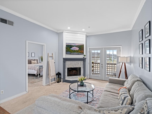 living room featuring crown molding, light carpet, and french doors