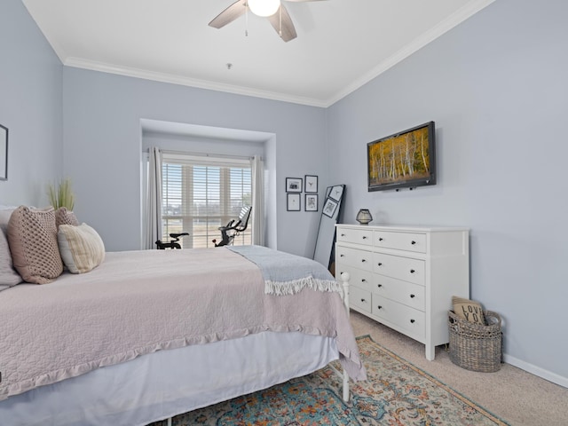 bedroom featuring ornamental molding, ceiling fan, and carpet