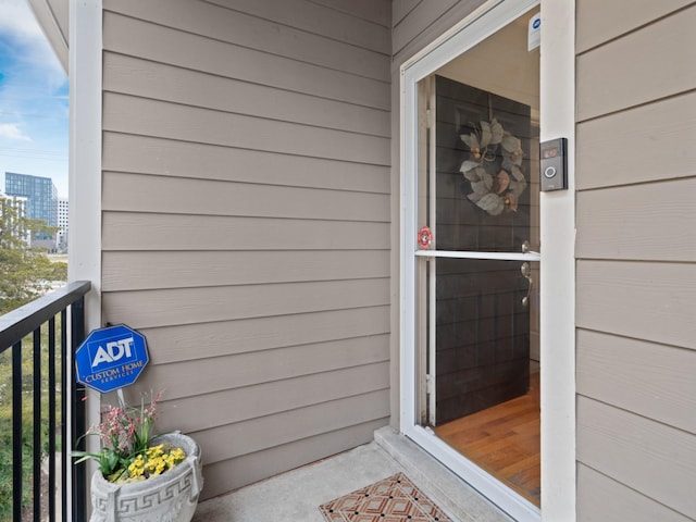 doorway to property featuring a balcony