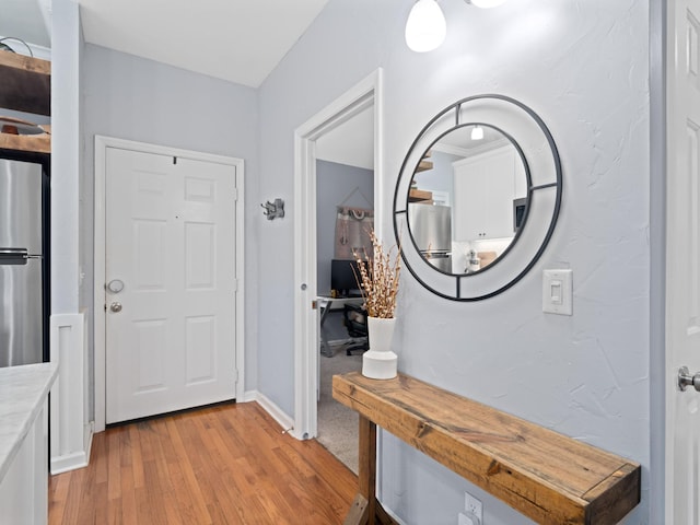 foyer featuring light hardwood / wood-style flooring