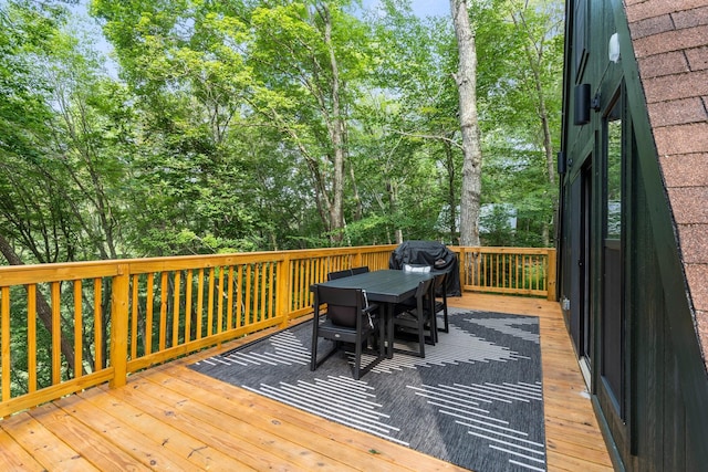 wooden deck with grilling area