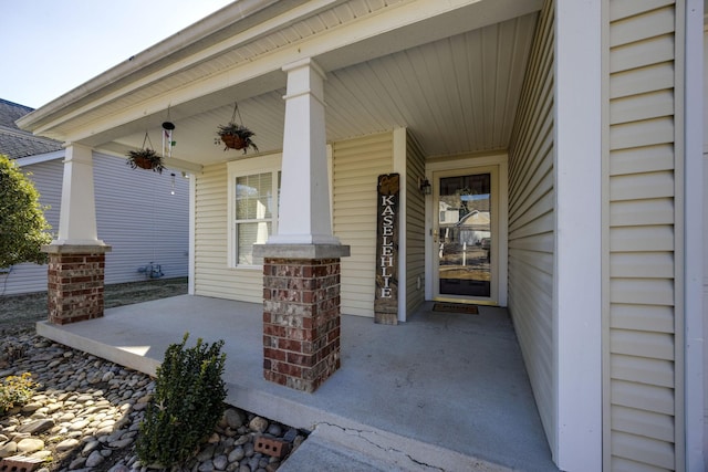 property entrance featuring covered porch