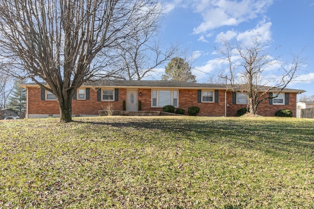 ranch-style home featuring a front lawn