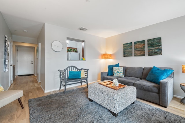 living room featuring light hardwood / wood-style floors