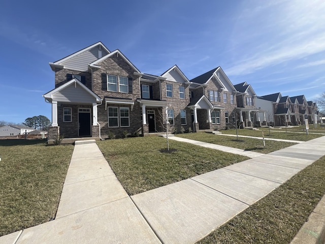 view of front of home featuring a front lawn