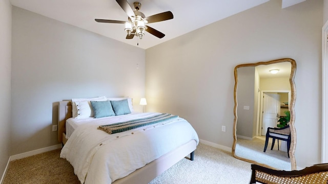 bedroom with light carpet and ceiling fan