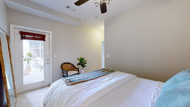 bedroom featuring ceiling fan, light carpet, and access to outside