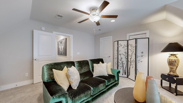 living room with light carpet and ceiling fan