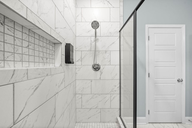 bathroom featuring an enclosed shower