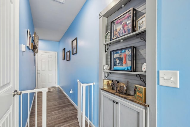 hallway featuring dark wood-type flooring