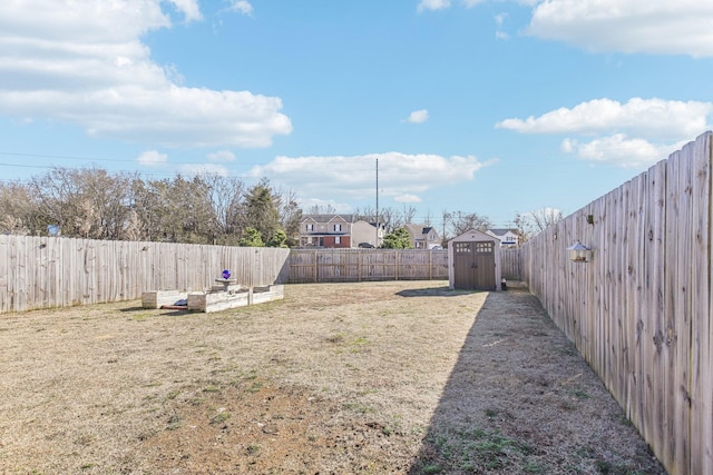 view of yard with a storage unit