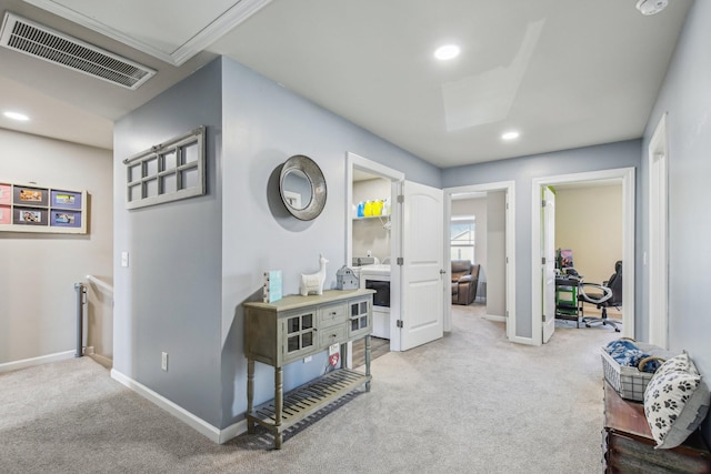 hallway with light carpet