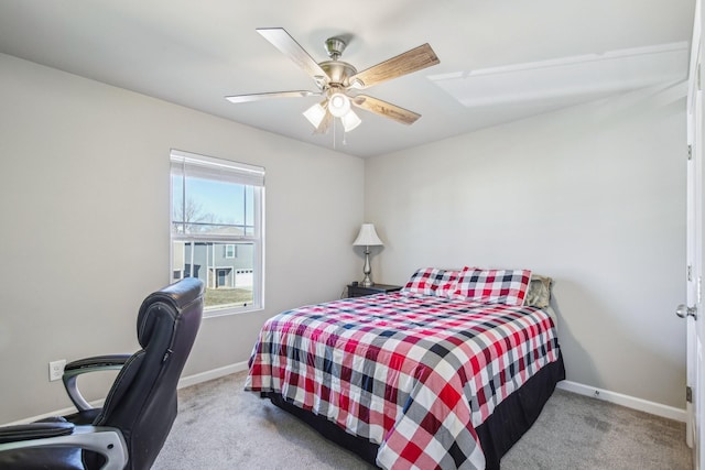 carpeted bedroom with ceiling fan