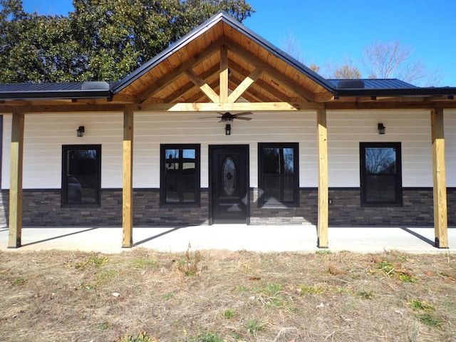 back of house with a patio and ceiling fan