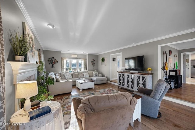 living room featuring wood-type flooring and ornamental molding