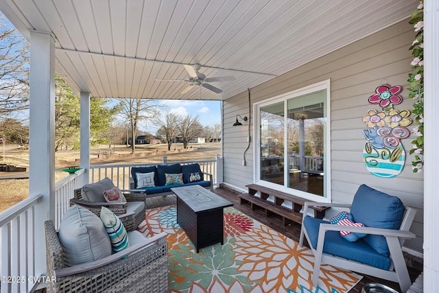 view of patio / terrace featuring ceiling fan and outdoor lounge area