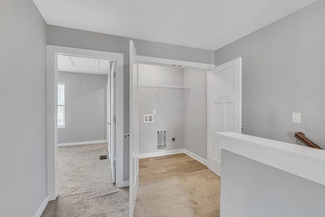 laundry area featuring hookup for an electric dryer, washer hookup, and light carpet