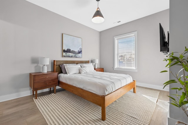 bedroom featuring light hardwood / wood-style floors