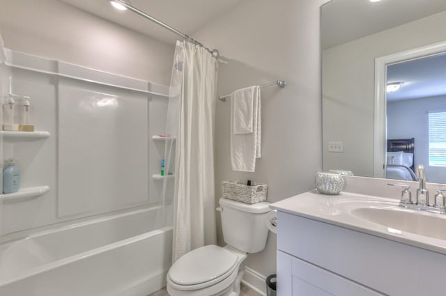 full bathroom featuring vanity, toilet, and shower / bath combo with shower curtain