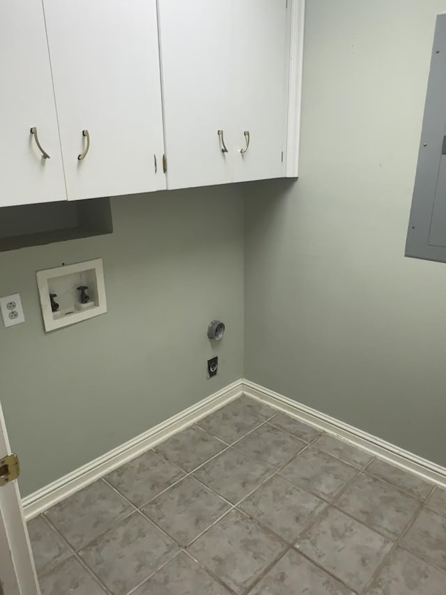 laundry area with cabinets, washer hookup, electric panel, and light tile patterned floors