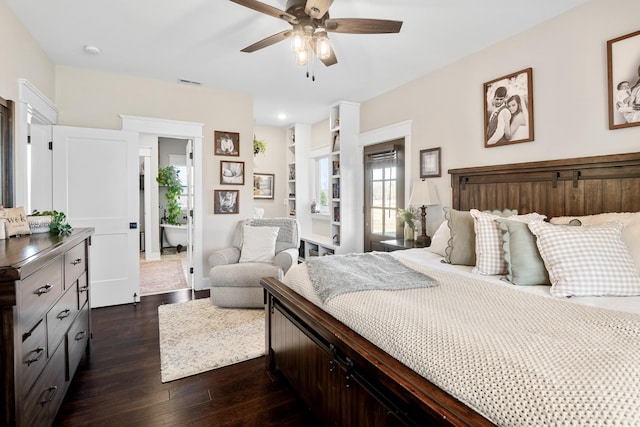 bedroom with ceiling fan and dark hardwood / wood-style flooring