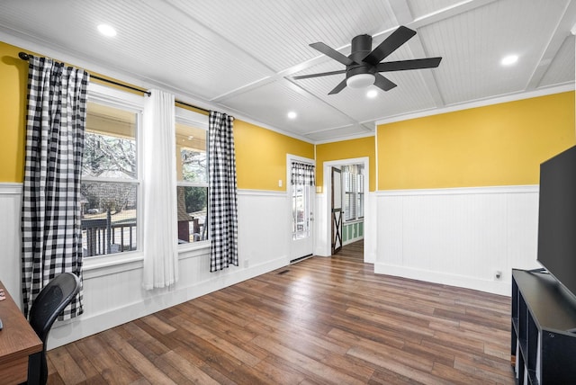 interior space with wood-type flooring and ceiling fan