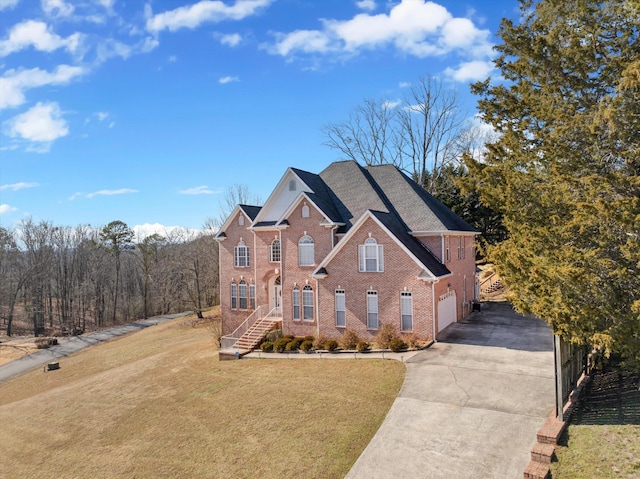 front of property with a garage and a front yard