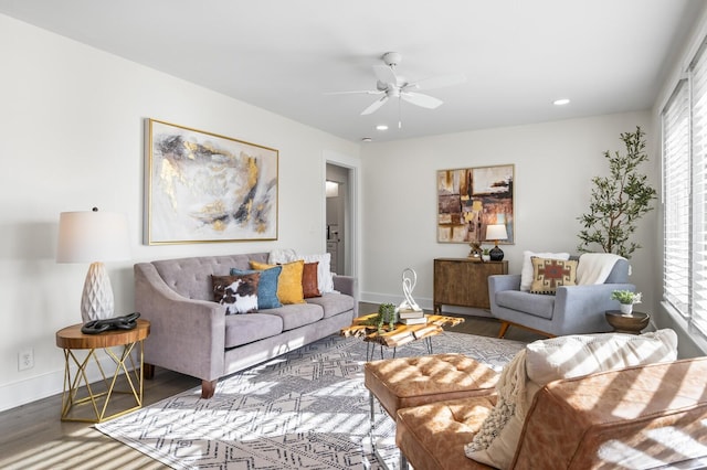 living room with ceiling fan and hardwood / wood-style floors