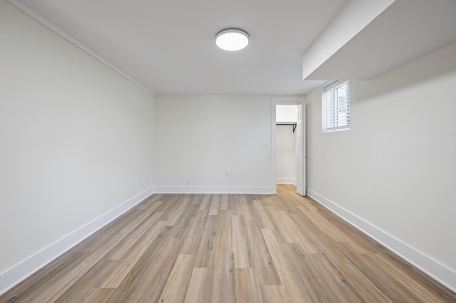 basement featuring light hardwood / wood-style floors