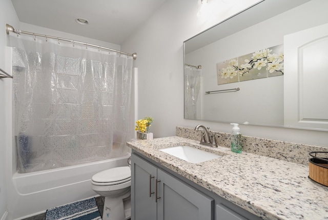 full bathroom with vanity, toilet, and shower / bath combo with shower curtain