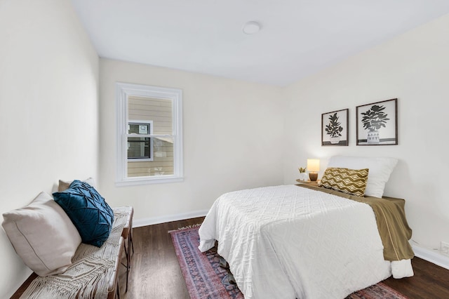 bedroom featuring dark hardwood / wood-style floors