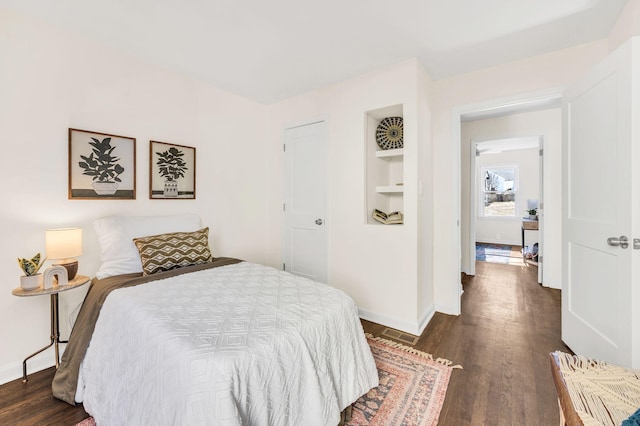 bedroom featuring dark hardwood / wood-style floors