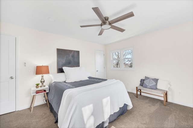 bedroom with ceiling fan and carpet flooring