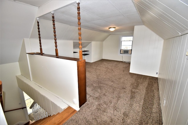 bonus room with cooling unit, vaulted ceiling, and carpet