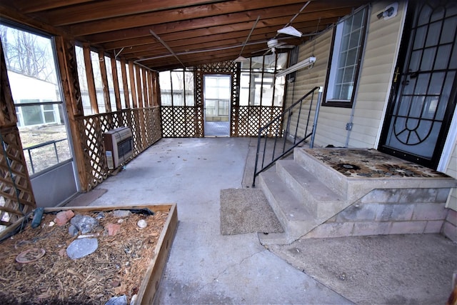 view of patio / terrace featuring heating unit