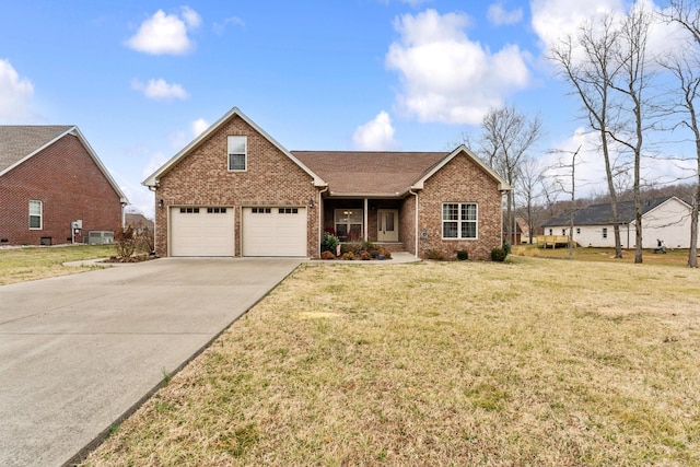 front facade with a garage, central AC unit, and a front yard