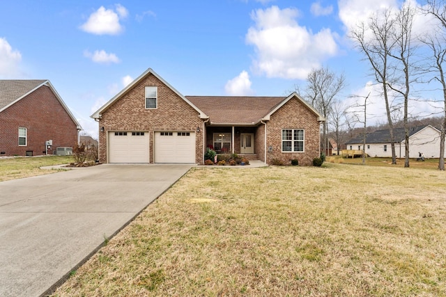 front facade with a garage, central AC unit, and a front yard