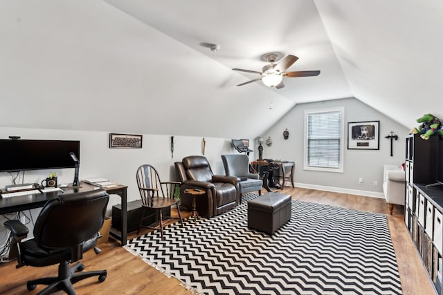 office area with ceiling fan, lofted ceiling, and light hardwood / wood-style flooring