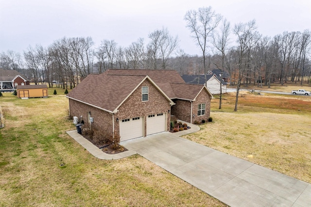 view of front of house featuring a garage and a front yard