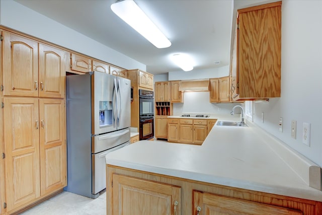 kitchen featuring wall chimney exhaust hood, sink, light tile patterned floors, kitchen peninsula, and black appliances