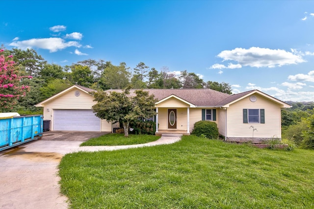 single story home featuring a garage and a front lawn