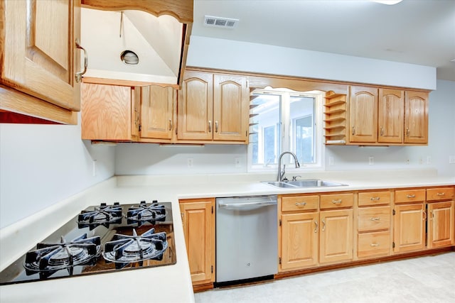 kitchen with sink, gas cooktop, and stainless steel dishwasher