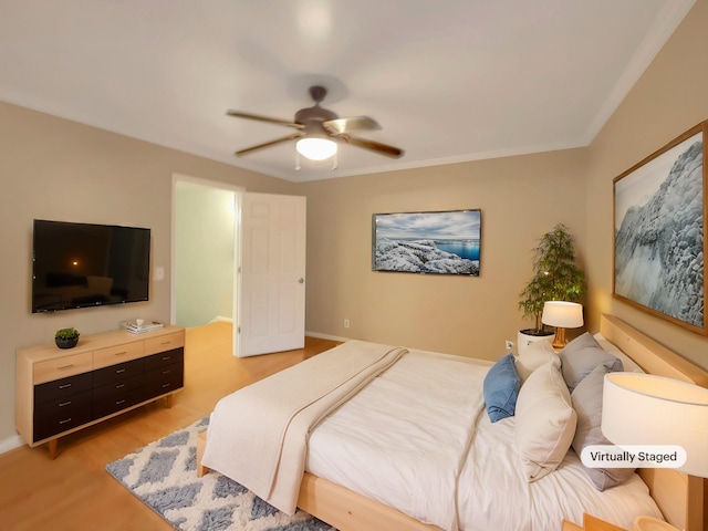 bedroom featuring ceiling fan and light wood-type flooring