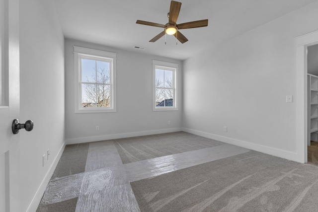 spare room featuring ceiling fan