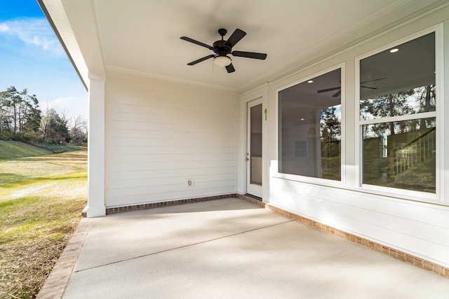 view of patio featuring a ceiling fan