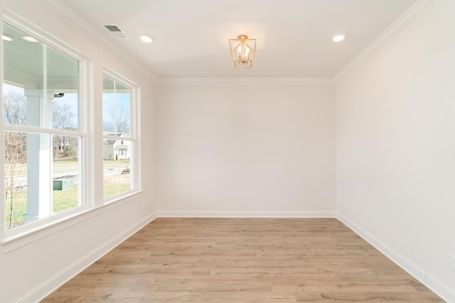 empty room featuring recessed lighting, visible vents, baseboards, light wood-style floors, and ornamental molding