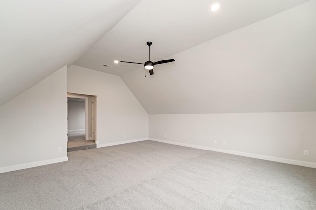 bonus room with recessed lighting, a ceiling fan, baseboards, vaulted ceiling, and carpet