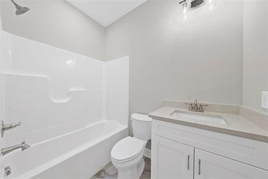 full bathroom with vanity, shower / tub combination, and toilet