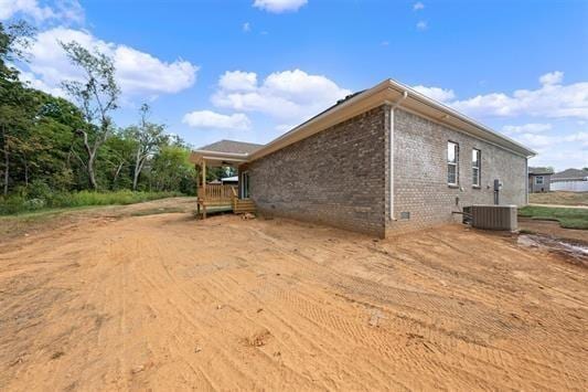 view of home's exterior featuring cooling unit